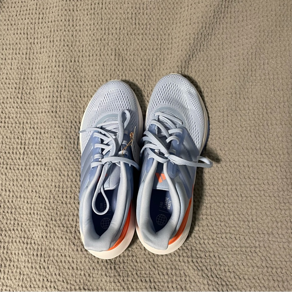 Like-new blue, orange, and white adidas running shoes size 9 women’s